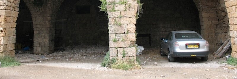 car in ancient garage